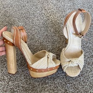 Schutz platform raffia sandals 8 knot with ankle straps.